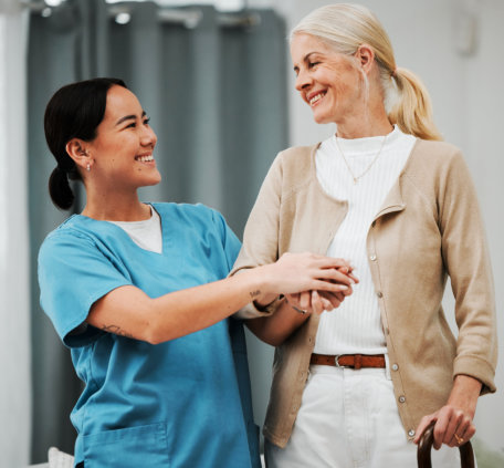 caregiver woman assisting a senior patient