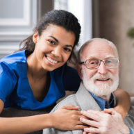 caregiver woman with senior man