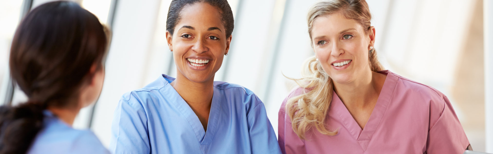 three caregivers talking